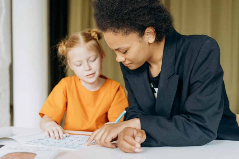 A child and adult working together on a learning activity, symbolizing support and evaluation for child development.