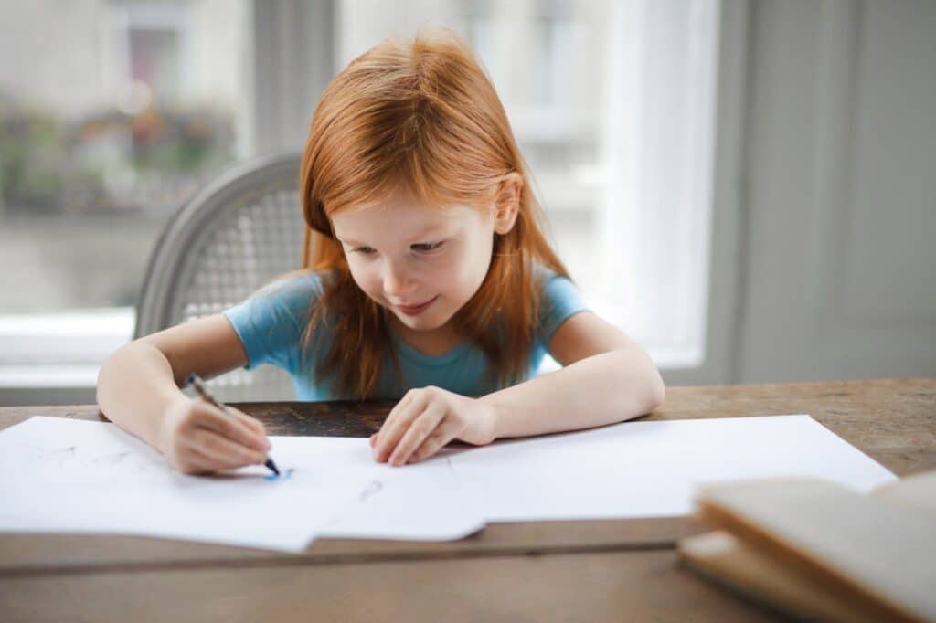 Child completing learning and attention tasks during a neuropsychological evaluation for kids
