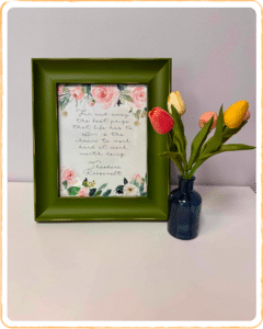 Wall displays two colorful paintings beside a sign reading Come As You Are, conveying acceptance and emotional safety